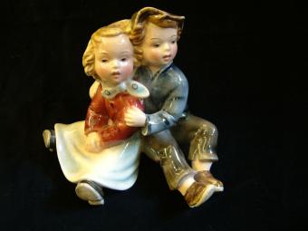 Porcelain Sculpture of a Couple of Children